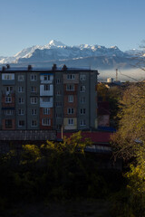 Apartment building with mountains in the background
