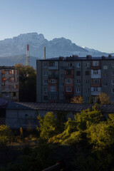 Apartment building with mountains in the background