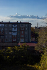 Apartment building with mountains in the background
