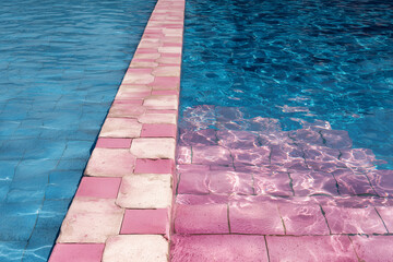 Obraz premium Blue Pool Water Texture With Pink Tiles
