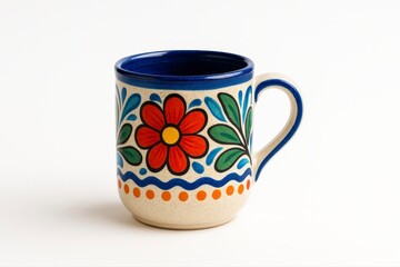 Isolated ceramic mug with floral design and blue rim on white background