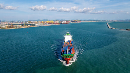 logistic cargo container ship sailing in sea to import export goods and distributing products to...