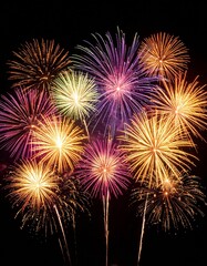A black background with colorful particles of light spreading out like fireworks