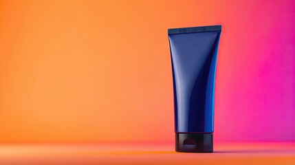 Dark blue toothpaste tube on orange pink gradient background, flat lay beauty product mockup. Beauty, cosmetics, product display, gradient, background, flatlay, toothpaste, tube, packaging, mockup.