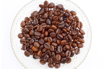Roasted scattered coffee beans flat lay top view on white background cutout file. Mockup template for artwork. Wallpaper banner