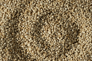 Uncooked White Quinoa Macro Top View. Natural Grain Background