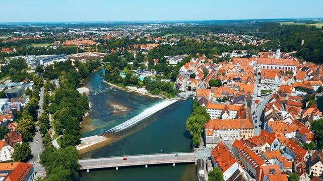 Landsberg am Lech, charming Bavarian town captured from drone. Historic old town, Lech River, Mari&auml; Himmelfahrt Church, aquapark, small waterfall and colorful summer scenery