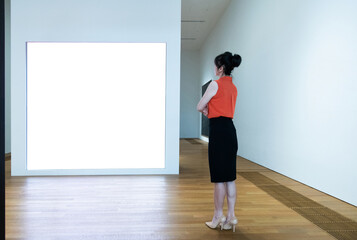 Women is watching an art exhibition