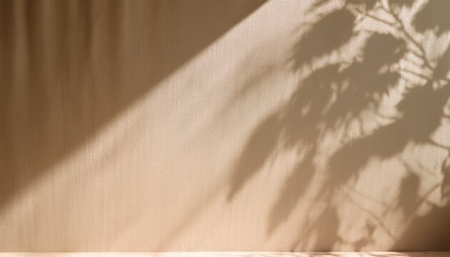 light background with blurred foliage shadow on beige wall plaster wall and curtains in sunlight