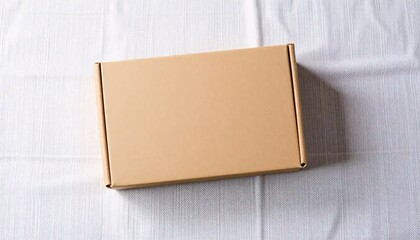 Cardboard box resting on wrinkled tablecloth