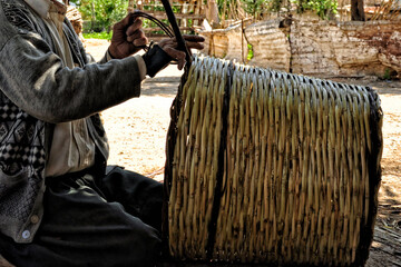 basket making,
The process of knitting or sewing flexible materials into three-dimensional works of...