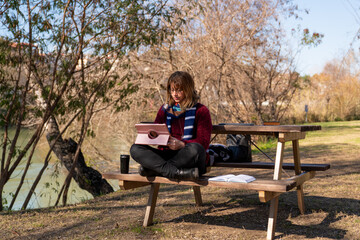 Remote Work in Nature. A Peaceful Outdoor Workspace by the River