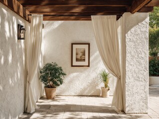 A white house with a white wall and a white door. A plant is in a pot on the floor