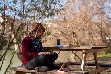 Remote Work in Nature. A Peaceful Outdoor Workspace by the River