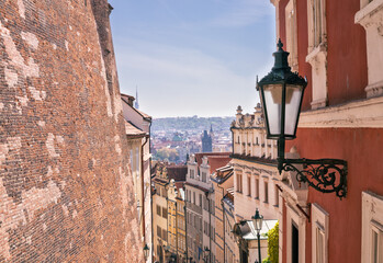 Scenic panoramic view over Prague city with red rooftops and historic landmarks