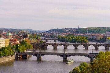 Panoramic view of Prague with Vltava River and historic bridges