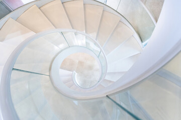 Beautiful white spiral staircase in the building