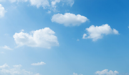 Background of blue sky with some white clouds