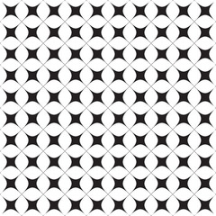 Seamless black and white geometric starburst pattern background