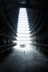 Businesswoman walking in the unfinished office building