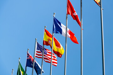 Flags of different countries in the sky