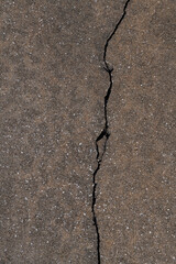 Close up of cement road with cracks
