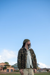 Contemplative man seen standing outdoors