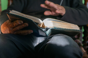 Man seen reading a bible 