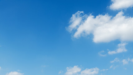 Background of blue sky with some white clouds
