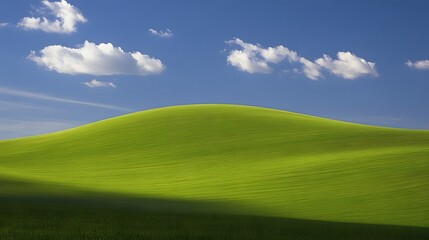 Fototapeta premium Serene Green Hill Landscape Under Blue Sky with Clouds