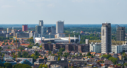 Aerial view of Eindhoven, Netherlands, featuring the Philips Stadion, modern high rise buildings,...