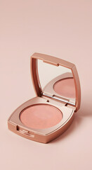 Elegant powder blush makeup displayed on a soft pink backdrop offering a touch of sophisticated feminine beauty and style.