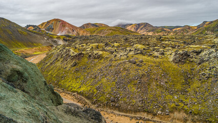 Landmannalaugar, Iceland. Laugahraun lava field. Panoramic view of rhyolite volcanoes and lonely...