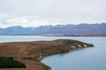 Serene Landscape with Lake and Mountains