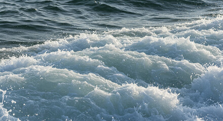 Mesmerizing ocean swell with frothy crests and foamy texture, evoking a sense of dynamic energy