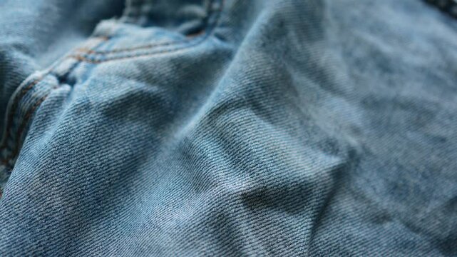 Wrinkled blue jeans close-up.
Stylish denim pants.
Denim texture.
Clothes, blue, denim, color, stylish, wrinkled
