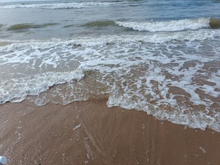 Waves on the sandy beach
