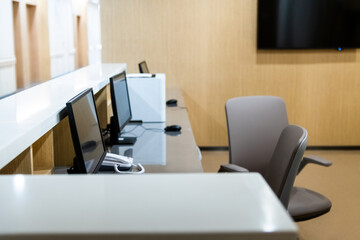Hospital reception with phone and computers