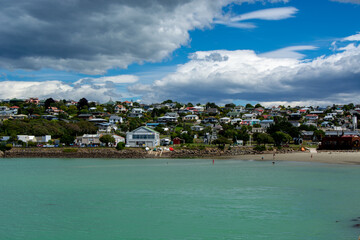 Scenic Coastal View with Colorful Houses and Turquoise Sea