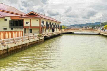Brunei river banks with promenade city street, buildings and bridge, Bandar Seri Begawan, Borneo, Sultanate Brunei Darussalam