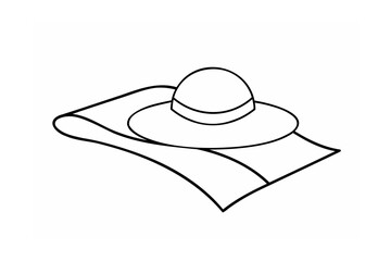 Wide brim hat resting on folded fabric accessory