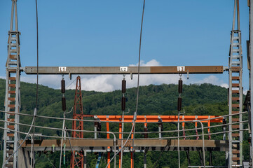 High voltage switch. High voltage electrical transformer substation. Power station. Power line.