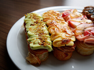 Assorted Gourmet Eclairs from the Sunday market.