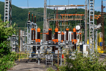 High voltage switch. High voltage electrical transformer substation. Power station. Power line.