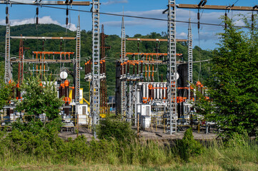 High voltage switch. High voltage electrical transformer substation. Power station. Power line.