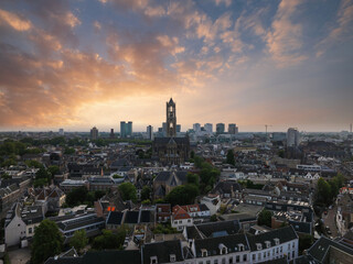 Aerial view of Utrecht, Netherlands, featuring the Dom Tower, traditional Dutch buildings, modern...