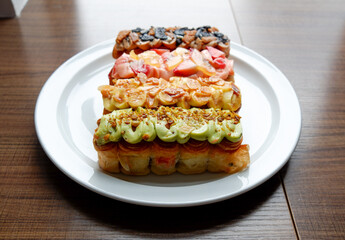Assorted Gourmet Eclairs from the Sunday market.