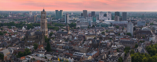 Aerial view of Utrecht, Netherlands, featuring the Dom Tower, historic architecture, modern...
