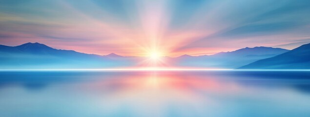 Obraz premium Peaceful Sunrise Over a Calm Lake and Misty Mountains