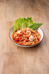 Spicy green papaya salad with shrimp 